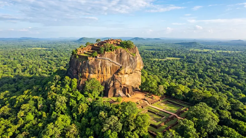 Sigiriya Rock Fortress rising from the jungle canopy in Sri Lanka