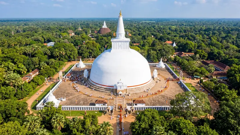 Aerial view of Ruwanwelisaya dagoba in Anuradhapura surrounded by tropical trees