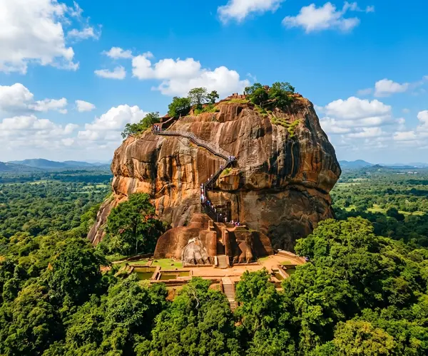 Sigiriya Rock Fortress rising from green jungle