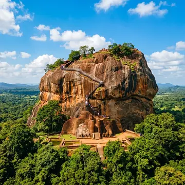 Sigiriya Rock Fortress rising from green jungle